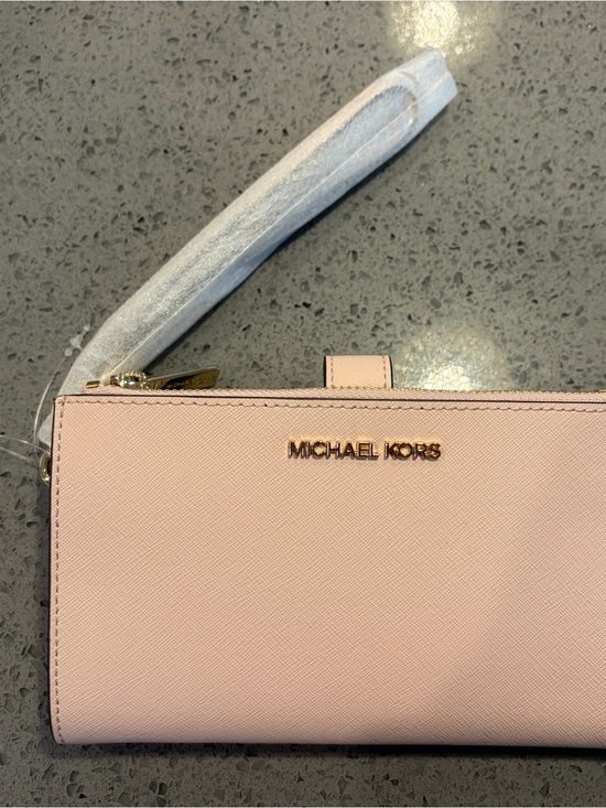 Michael Kors Handbags - Michael Kors Light Pink Saffiano Leather Wristlet